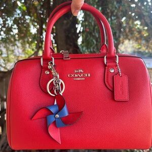 Coach  Rowan satchel Miami Red with charm